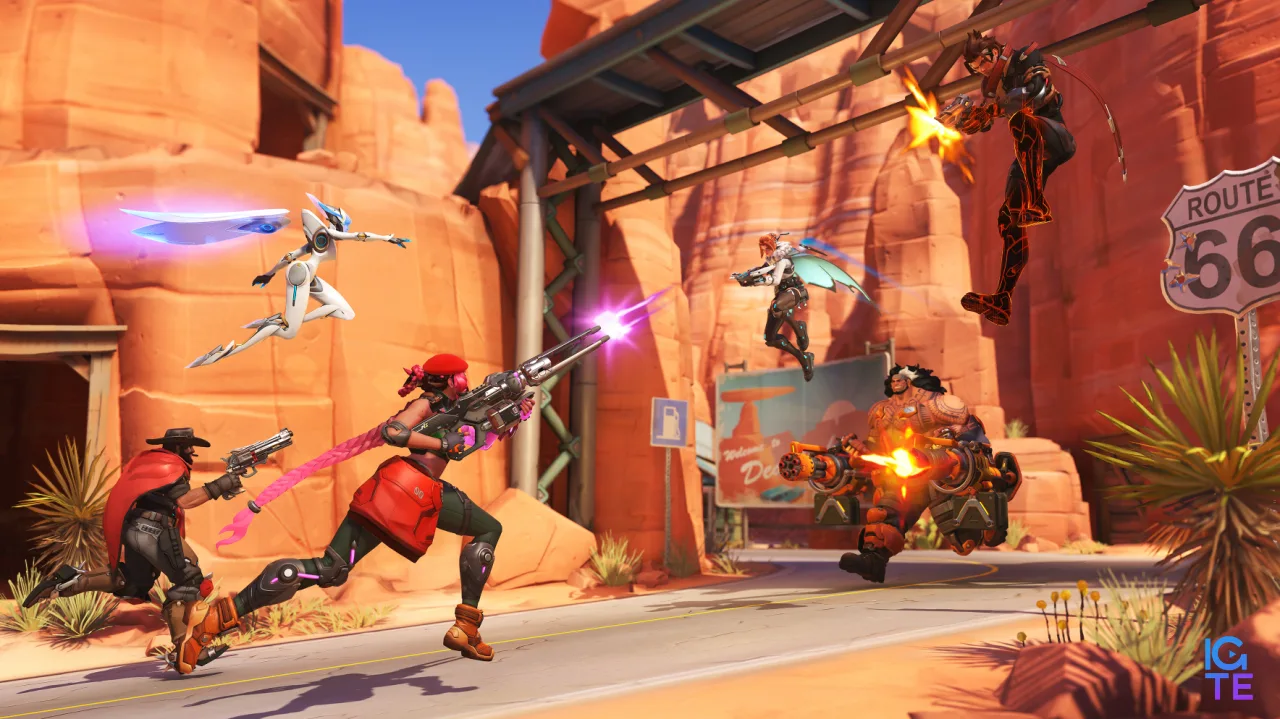 Таблиця рівнів Overwatch: Sierra, Cass і Echo стріляють по Emre, Freja та Mauga попереду них на Route 66.