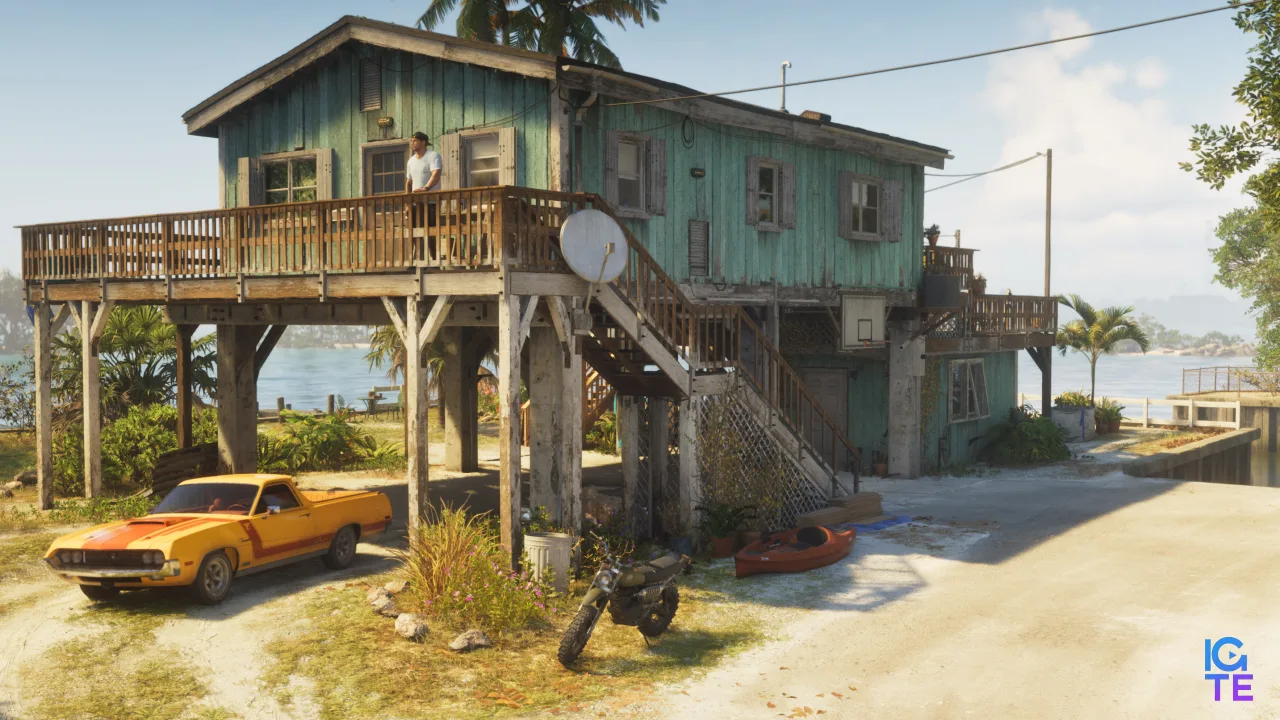 Beach house with car and motorbike.